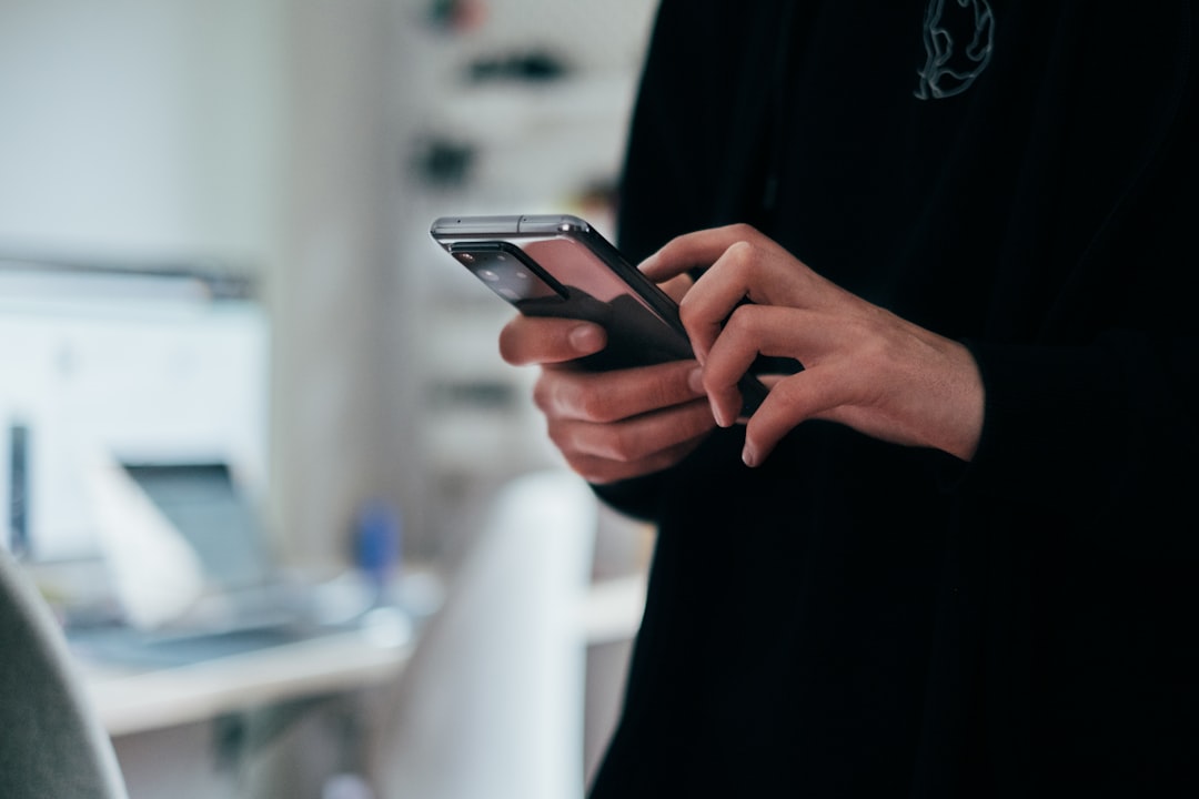 Person holding a smartphone, representing on-device AI setup — Photo by Jonas Leupe on Unsplash. Source: https://unsplash.com/photos/person-holding-black-android-smartphone-wK-elt11pF0